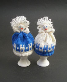 PAIR OF HAND-KNITTED LADY EGG COSIES 