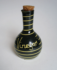BABBACOMBE POTTERY 1950s BLACK WITH YELLOW SWIRLS VINEGAR BOTTLE
