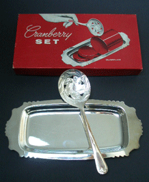       1950s SILVER-PLATED CRANBERRY SAUCE SERVING PLATE AND SPOON IN ORIGINAL BOX