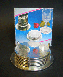  BOXED 1960s 7 PIECE SILVER-PLATED COASTER SET