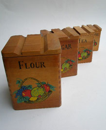 SET OF FOUR GRADUATED 1950s WOODEN STORAGE BOXES